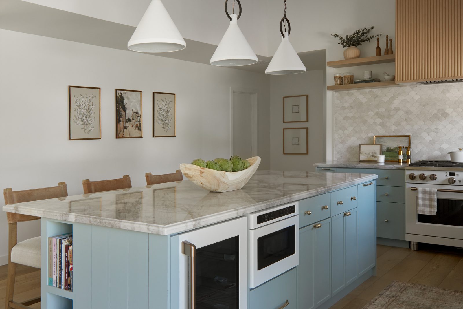 The Boardwalk Beach House kitchen island by Hearth Homes Interiors